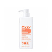 A 300 mL bottle of MUVO Just Peachy Shampoo on a solid white background. The bottle is white with a white pump dispenser and features a label with orange text and a peach-colored graphic.