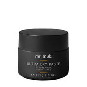 A black jar of Mr. Muk Ultra Dry Paste with strong hold and ultra matte finish, shown on a clean white background.